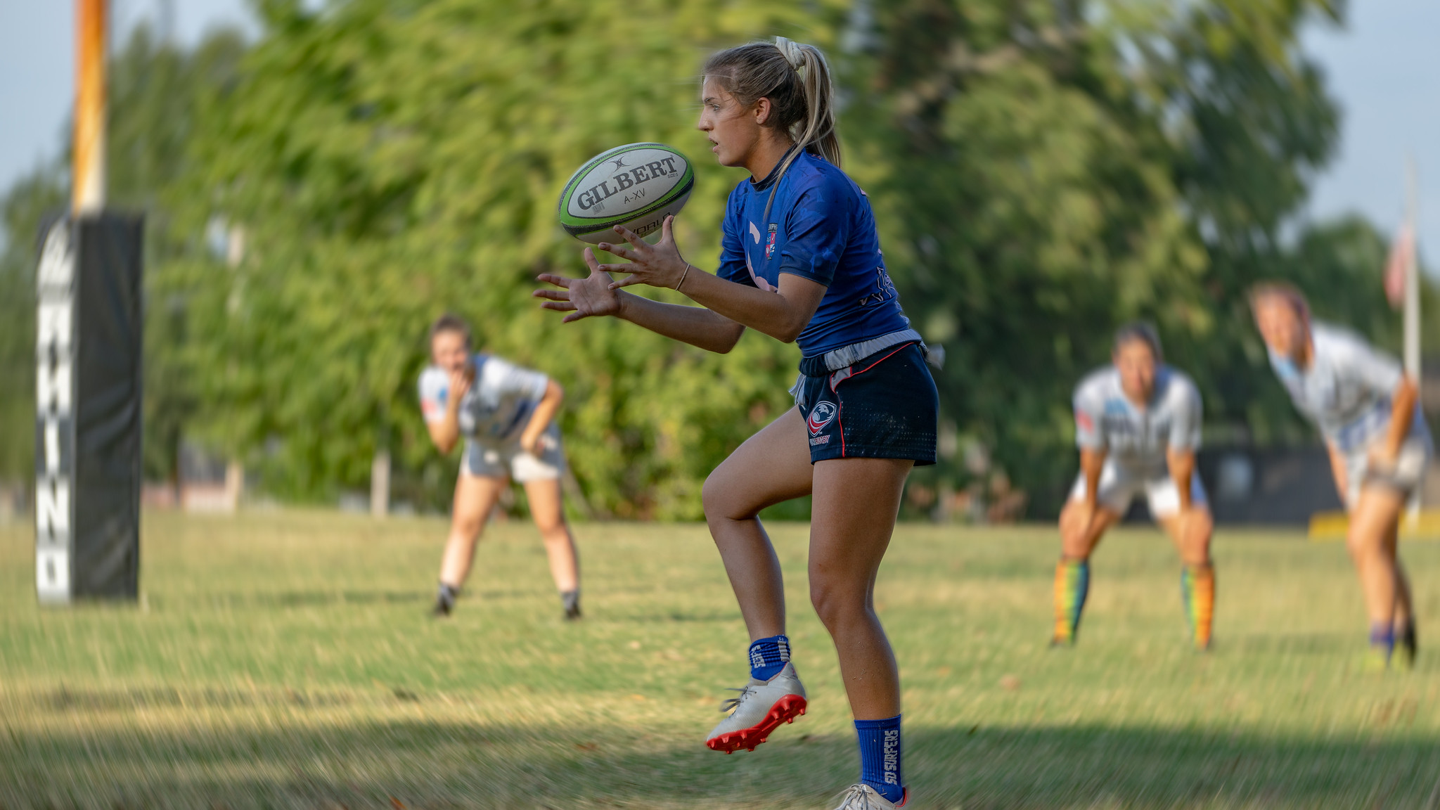 Woman playing rugby