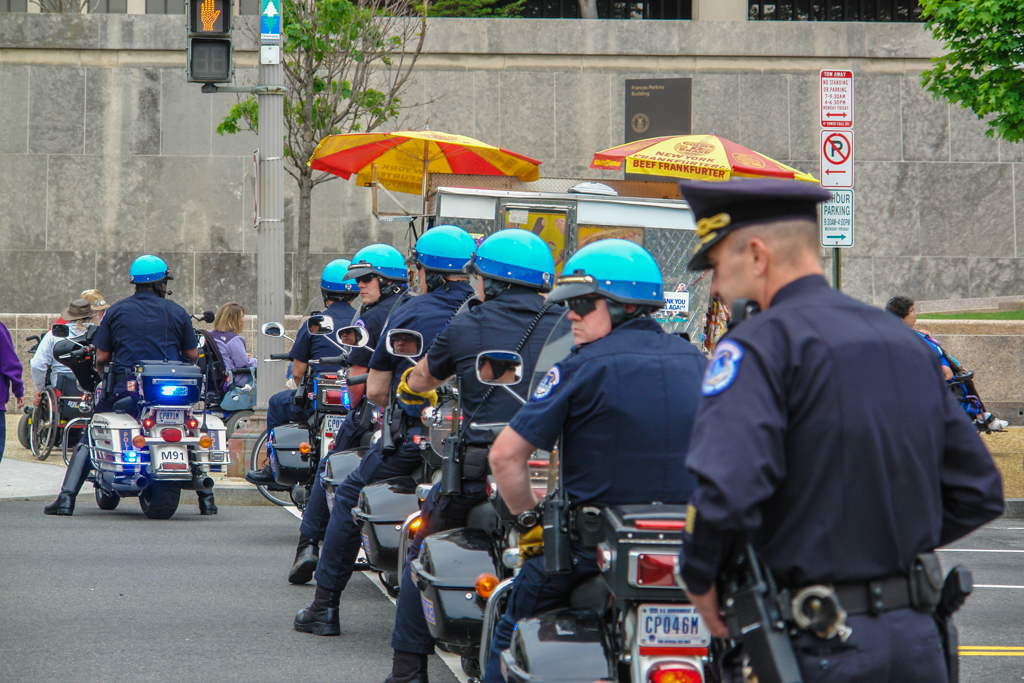  6 motorcycle police officers in a line 