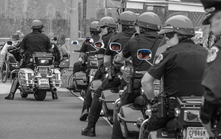  6 motorcycle police officers in a line 