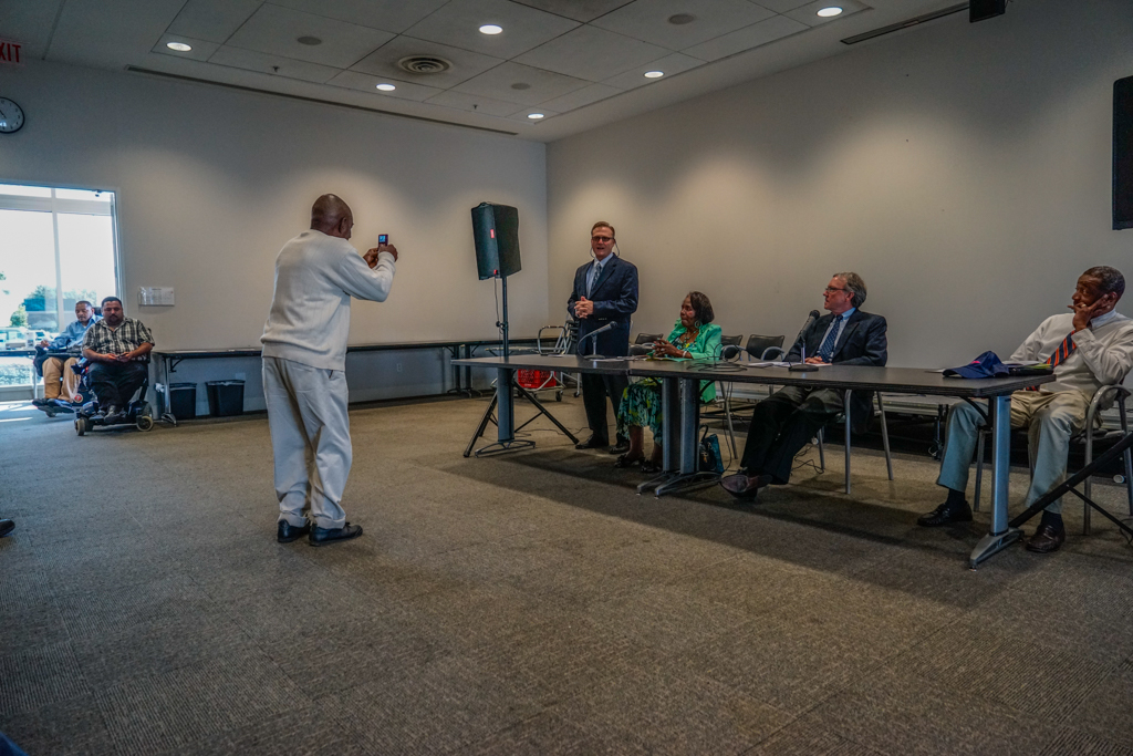  Man taking a photo with his phone 