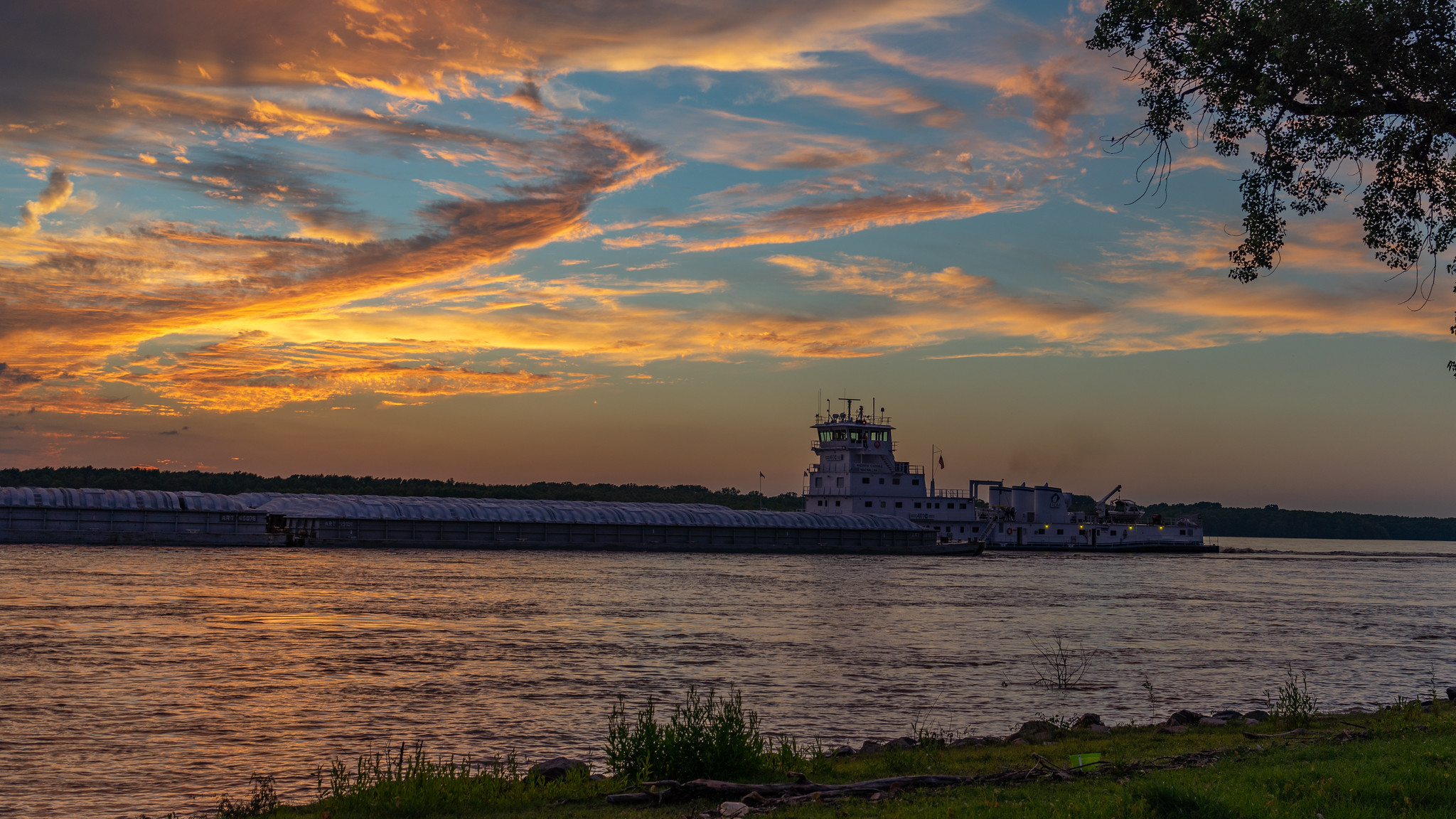  barg on the river at sunset 